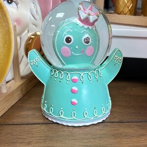 Teal gingerbread Snow Globe Figurine by Glitterville